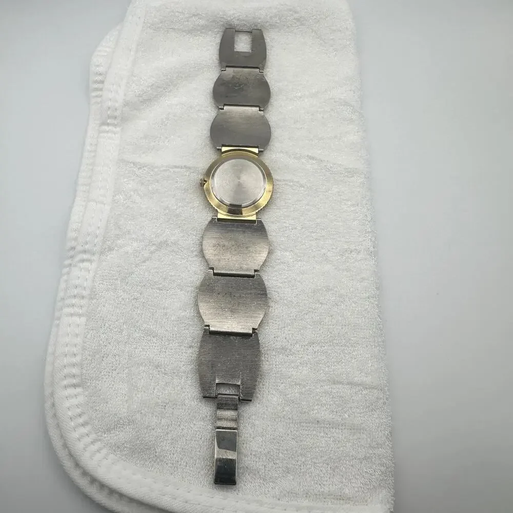 Xanadu Quartz Watch Two Tone Gold Silver Ornate Link Bracelet Black Dial